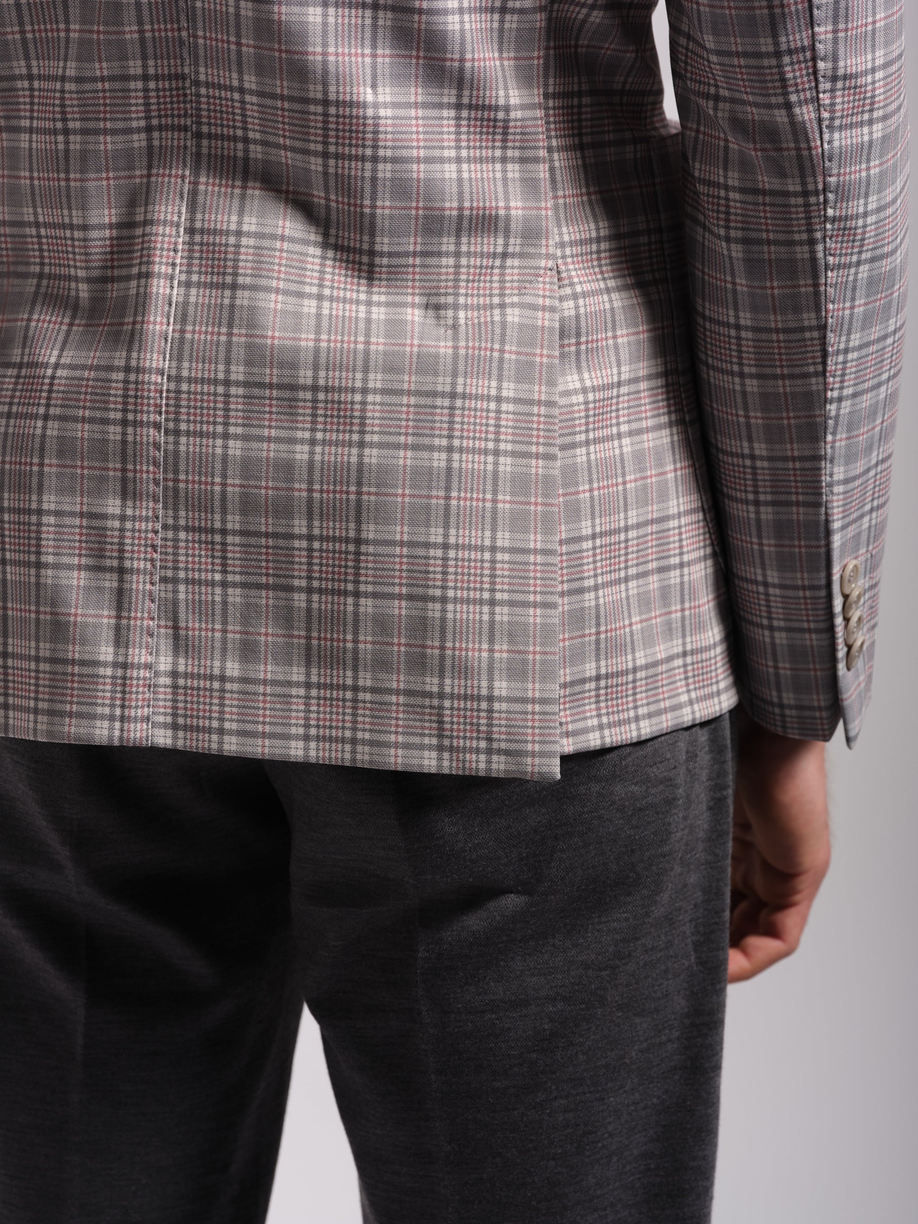 Side vents on grey check multi-colored jersey blazer