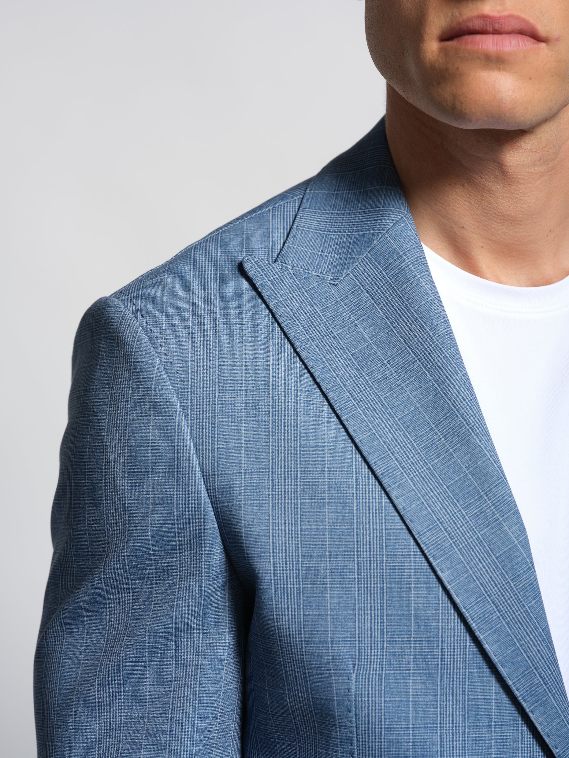 Prince de Galles stretch cotton-blend jersey fabric close-up wide peak lapel