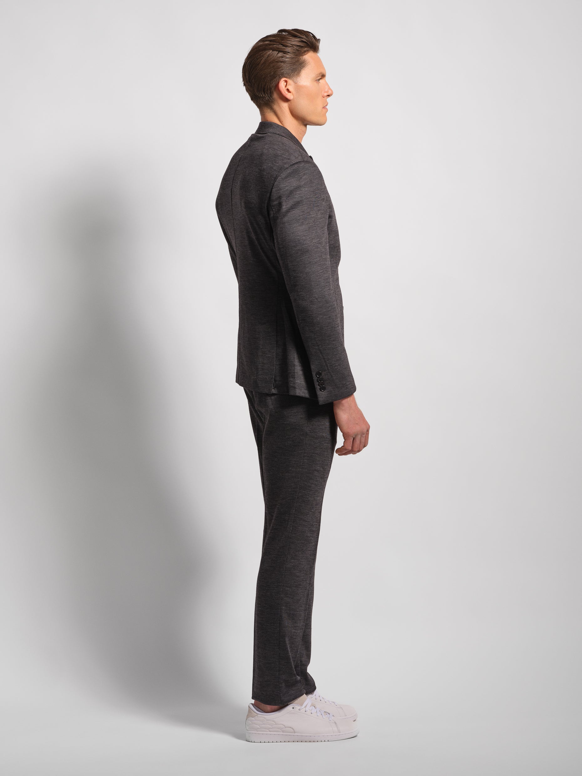 Charcoal grey jersey stretch suit side view