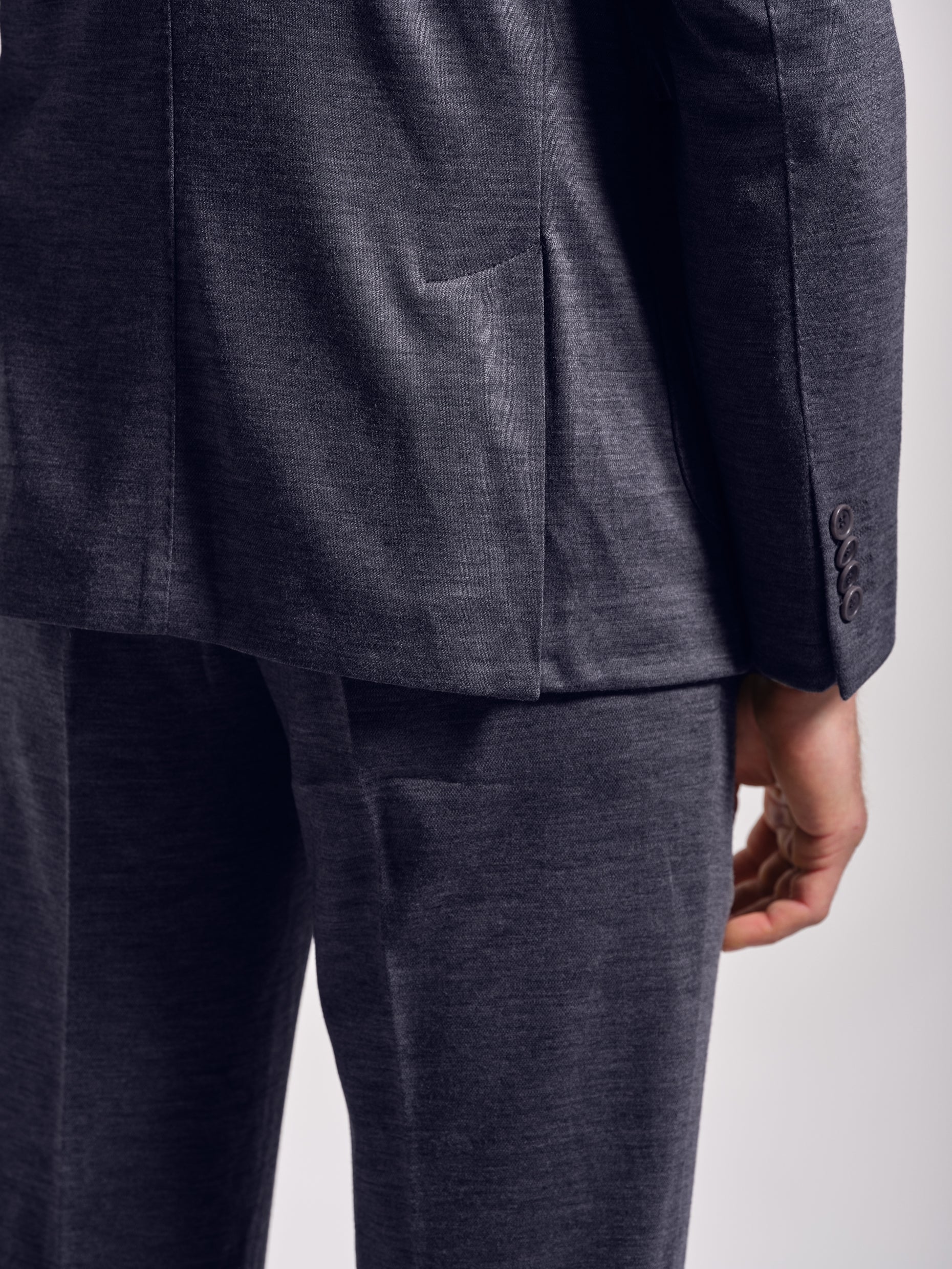 Blue jersey stretch suit side vents