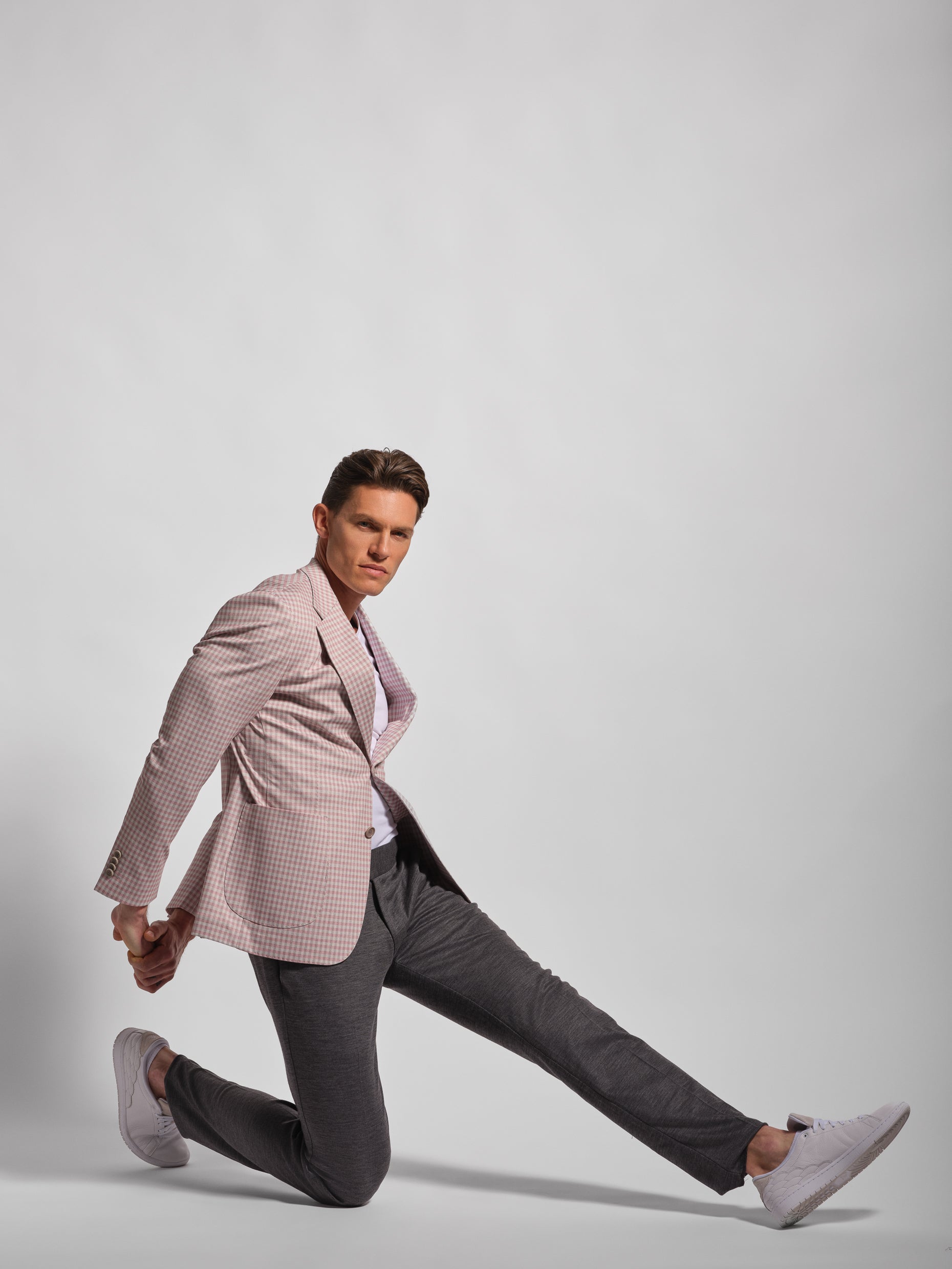 athlete in pink small multi-check stretch jersey blazer and pants