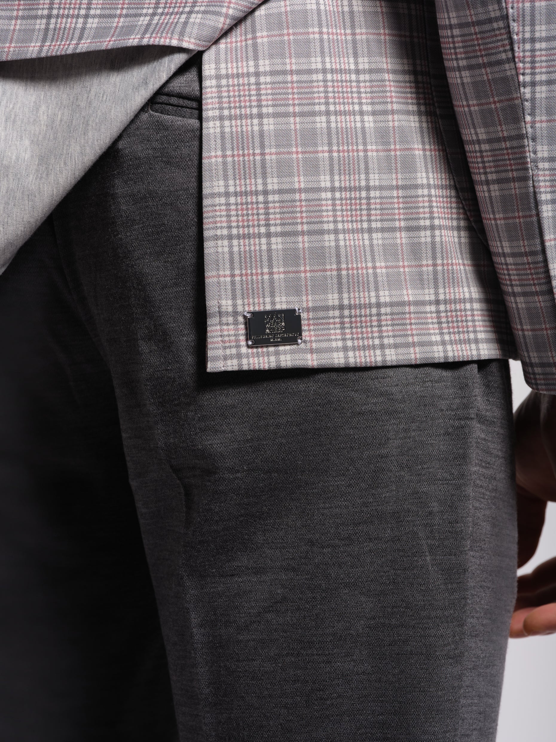 Side vents on grey check multi-colored jersey blazer double vents