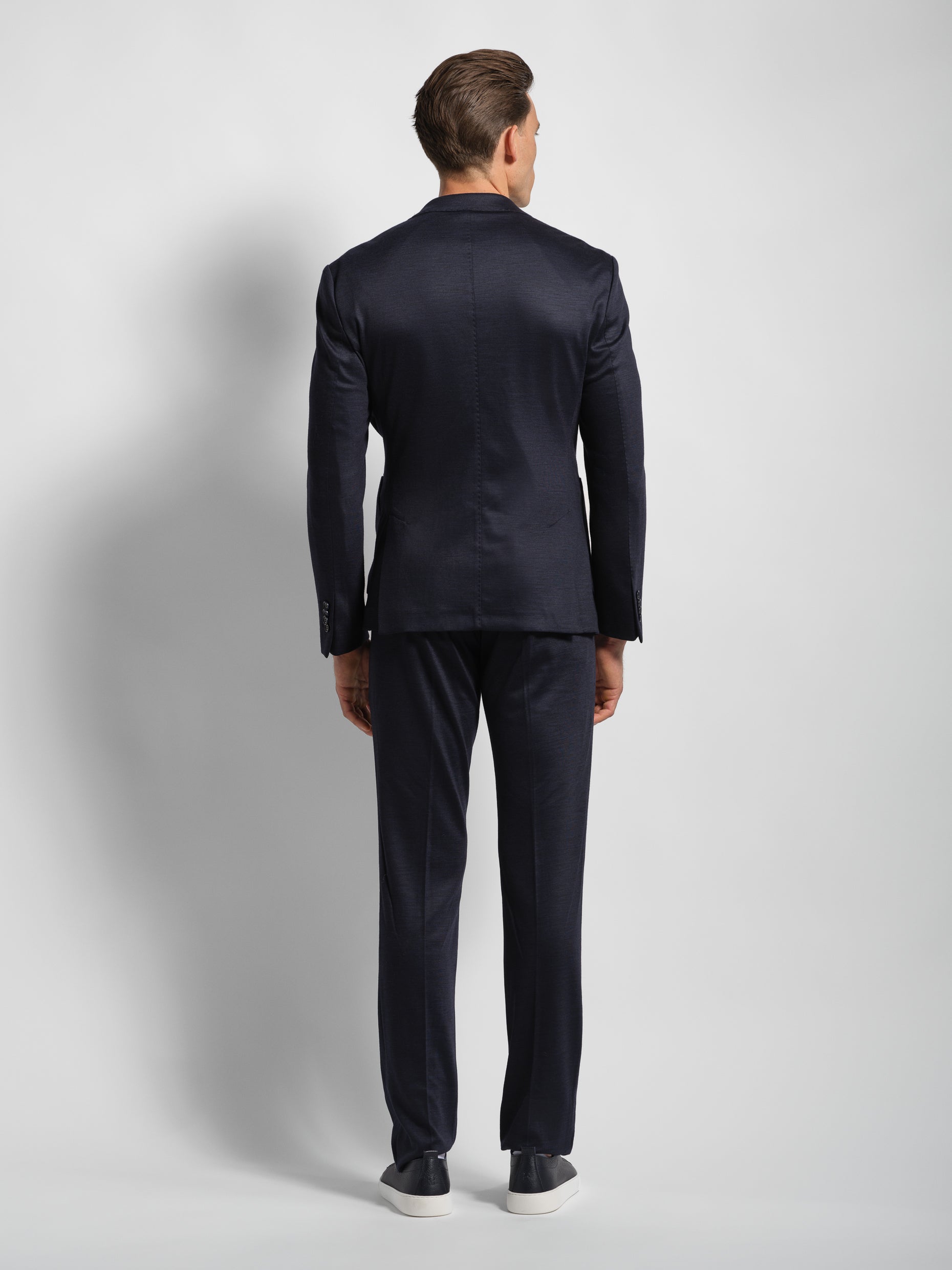 Navy jersey stretch suit back view 