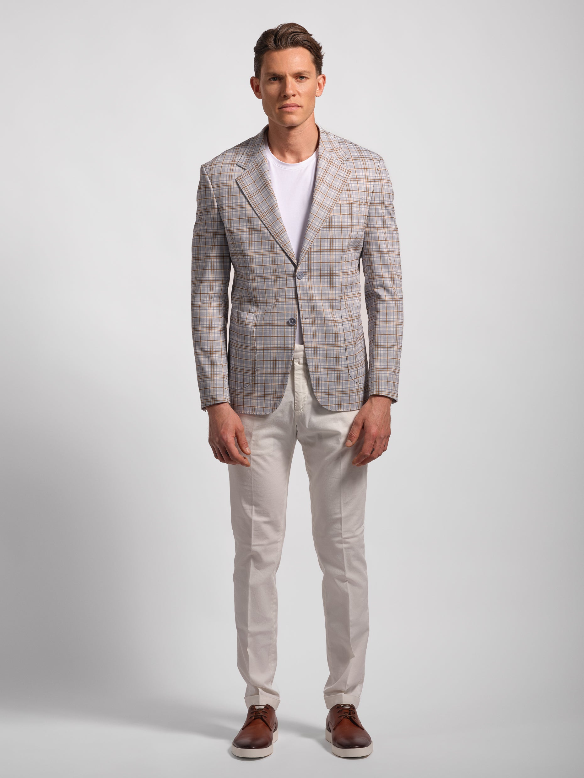 Wide check multi-colored jersey blazer jacket front view with white pants