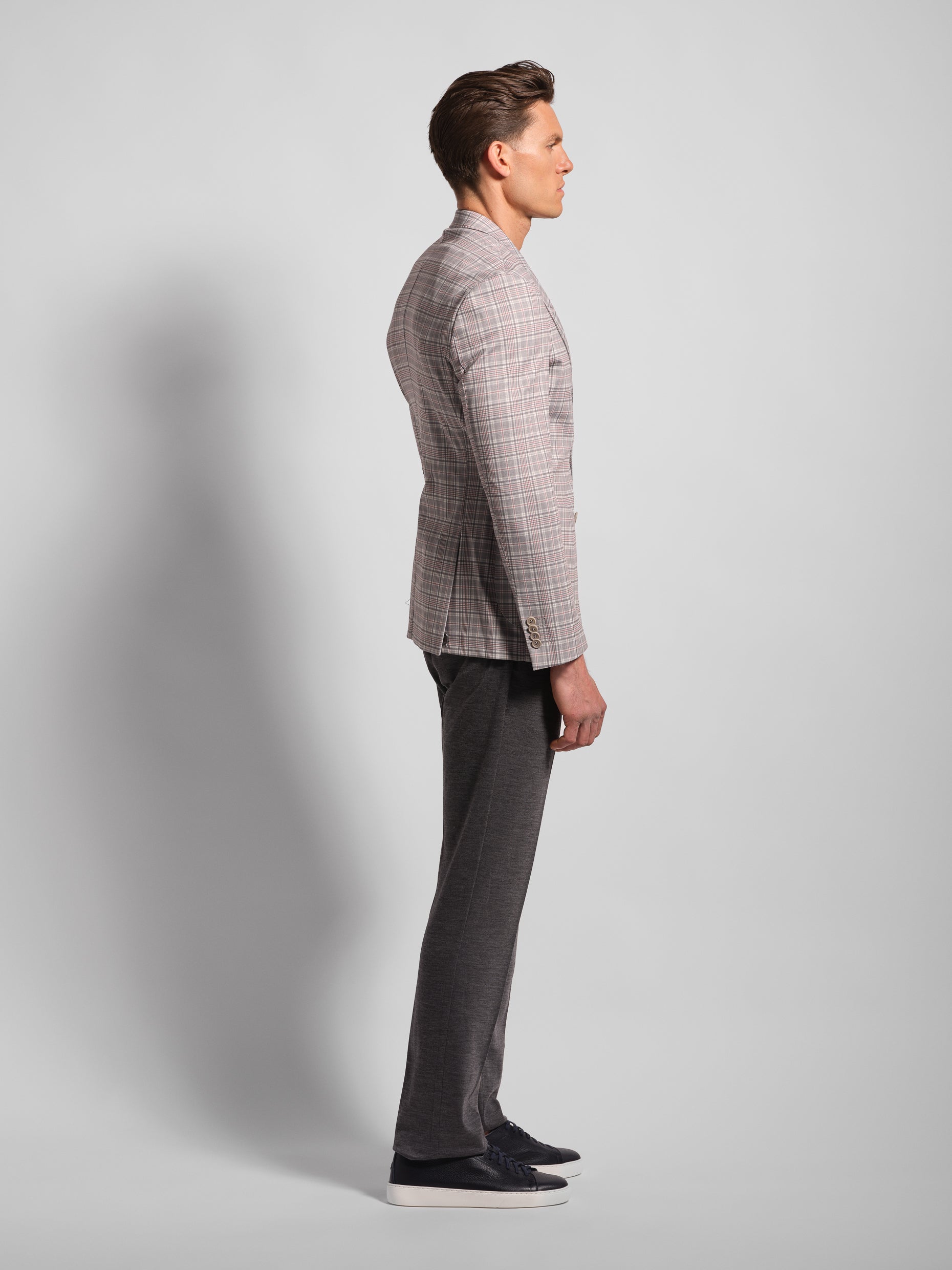 Side profile on grey check multi-colored jersey blazer double vents